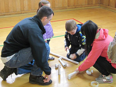 Youth making wind turbines with the Physics Club